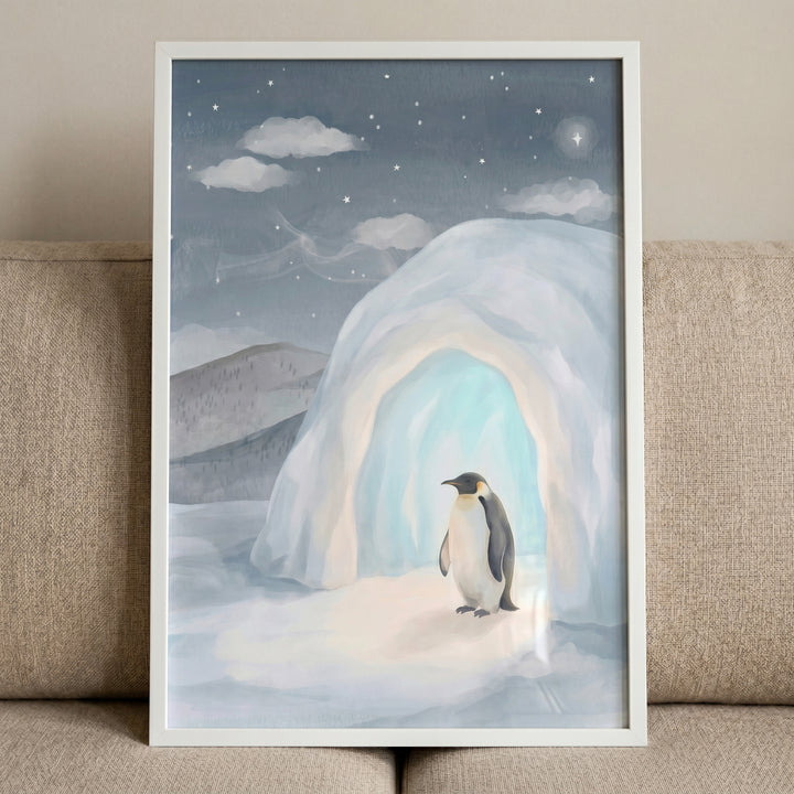 Muted blue igloo penguin wall art featuring a penguin standing at an igloo entrance under a starry night sky.
