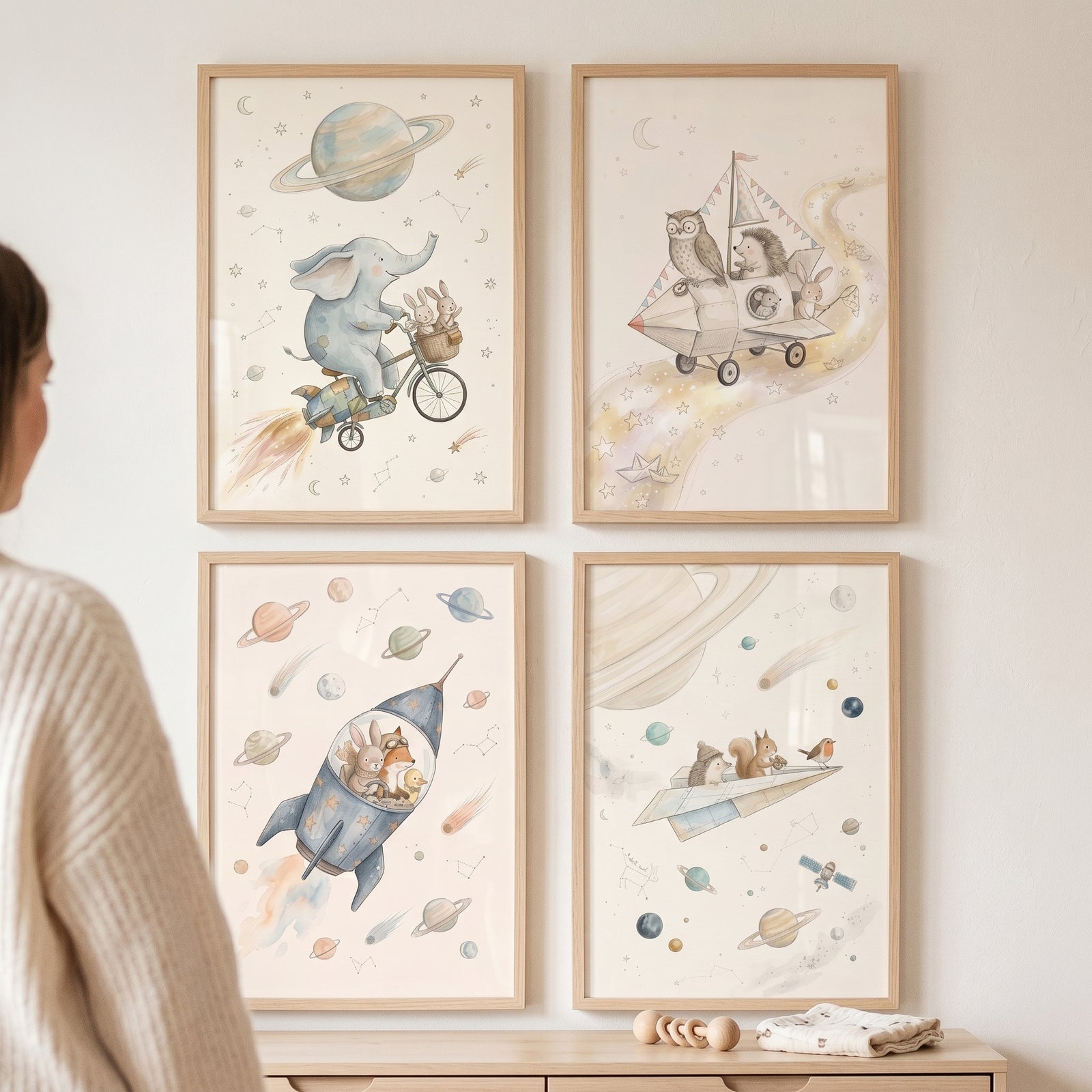 Muted cosmic traveler animals wall art set of 4 features animals in whimsical space vehicles amidst stars and planets.