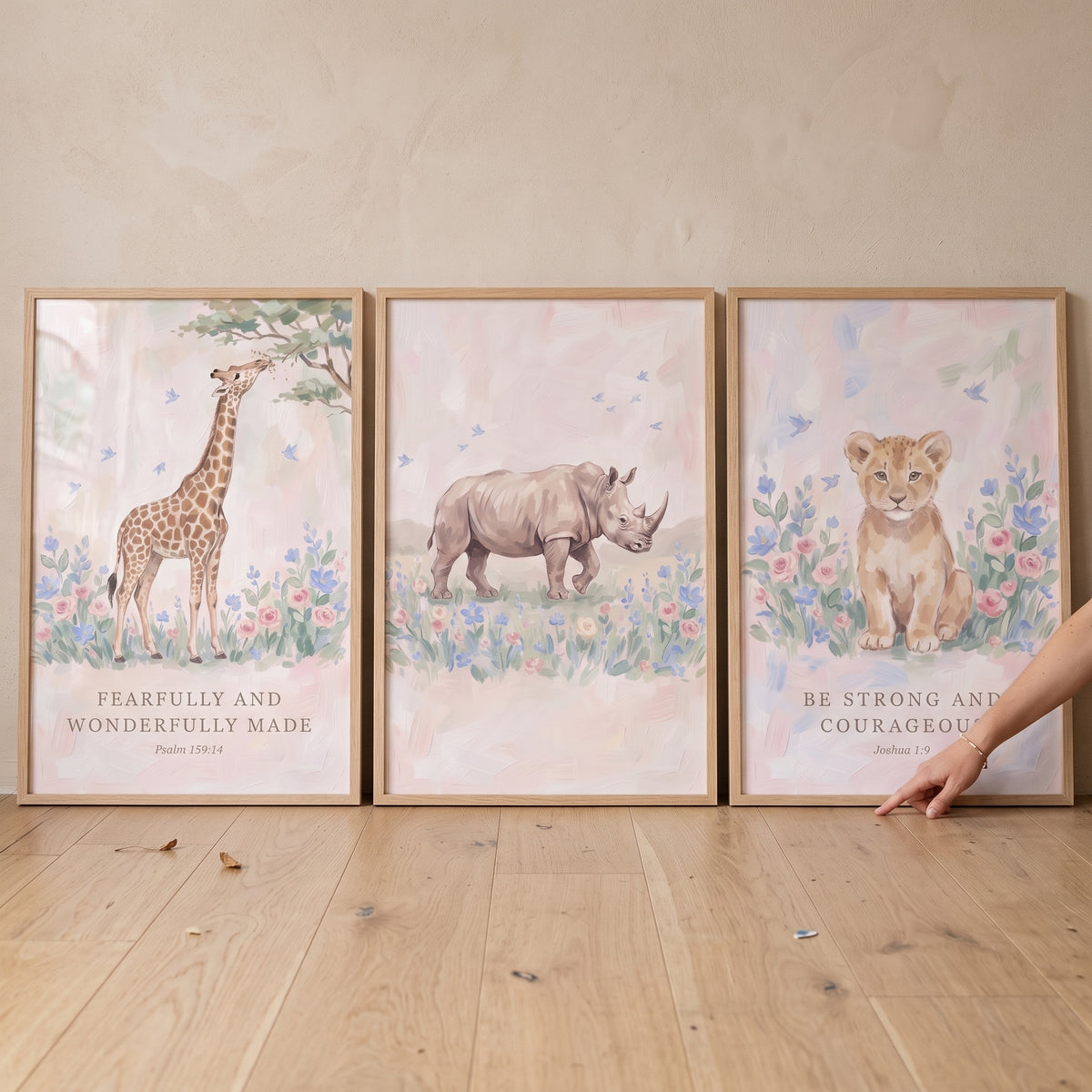 Muted pastel safari animals wall art set of 3 featuring a giraffe, rhino, and lion cub with biblical text.