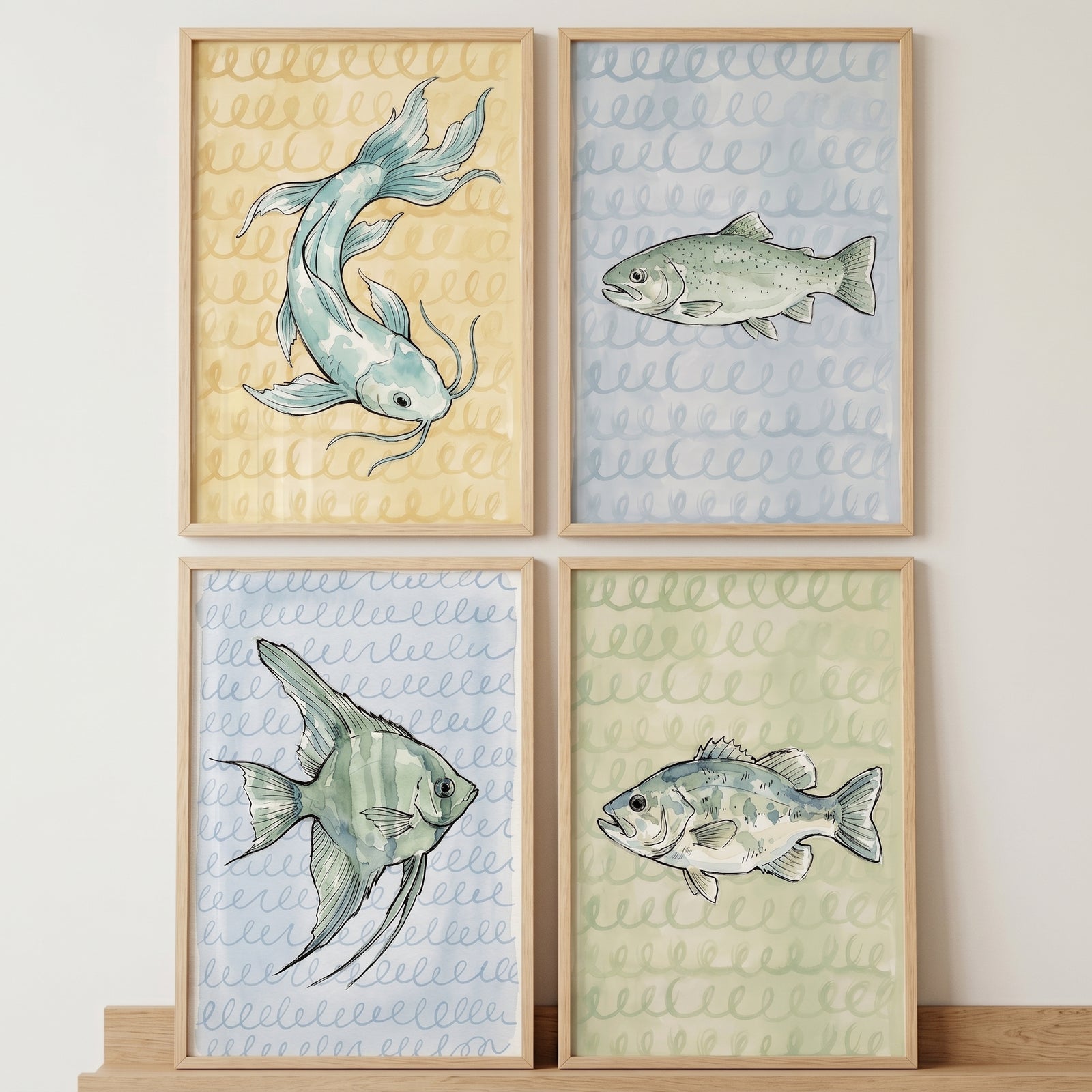 Muted pastel watercolor fish wall art set of 4 featuring four different fish species in light wood frames.