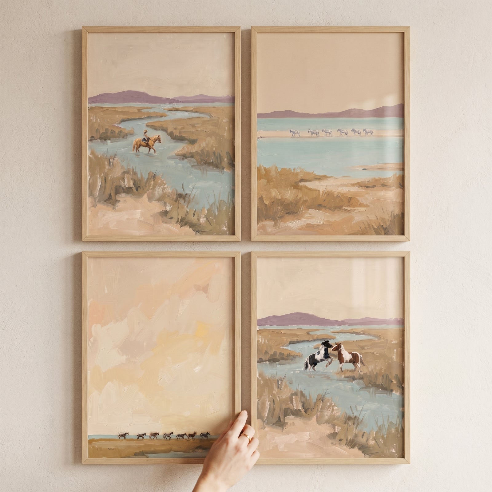 Muted sage coastal horses wall art set of 4 features horses by marshes and coastal waters inside natural wood frames.