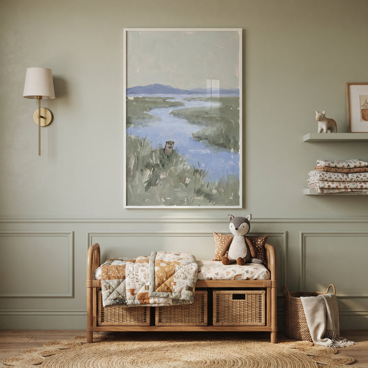 Muted sage green otter artwork hangs on a paneled wall above a storage bench with wicker baskets and a stuffed fox.