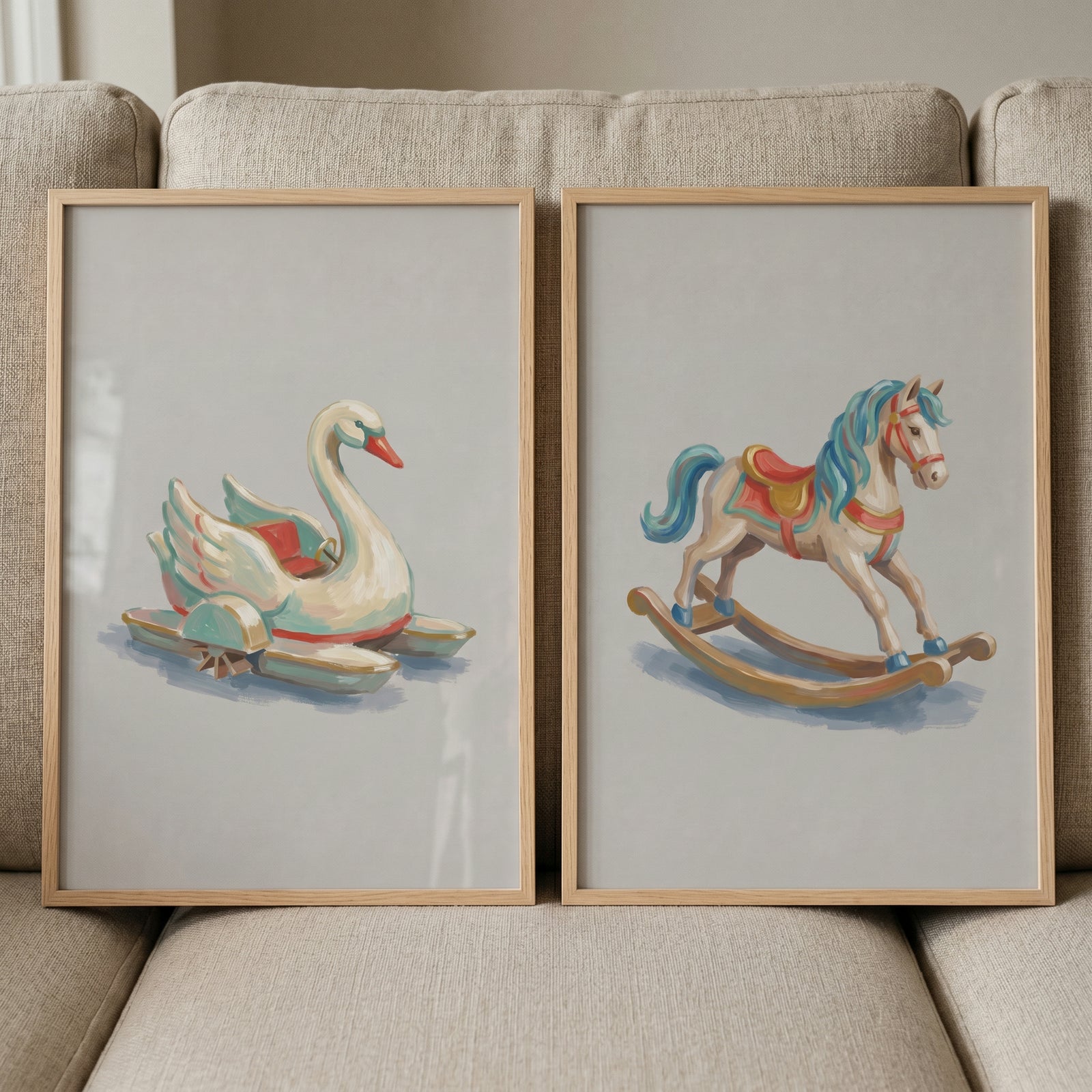 Muted vintage ride wall art set of 2 featuring a swan ride and a rocking horse in light wood frames on a tan couch.