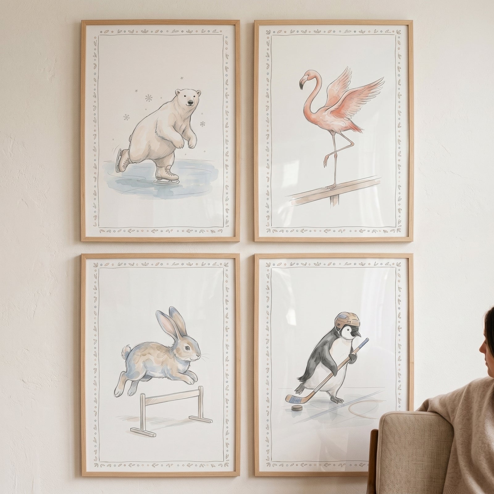 Muted watercolor sports animals wall art set of 4 features a skating bear, flamingo, jumping rabbit, and hockey penguin.