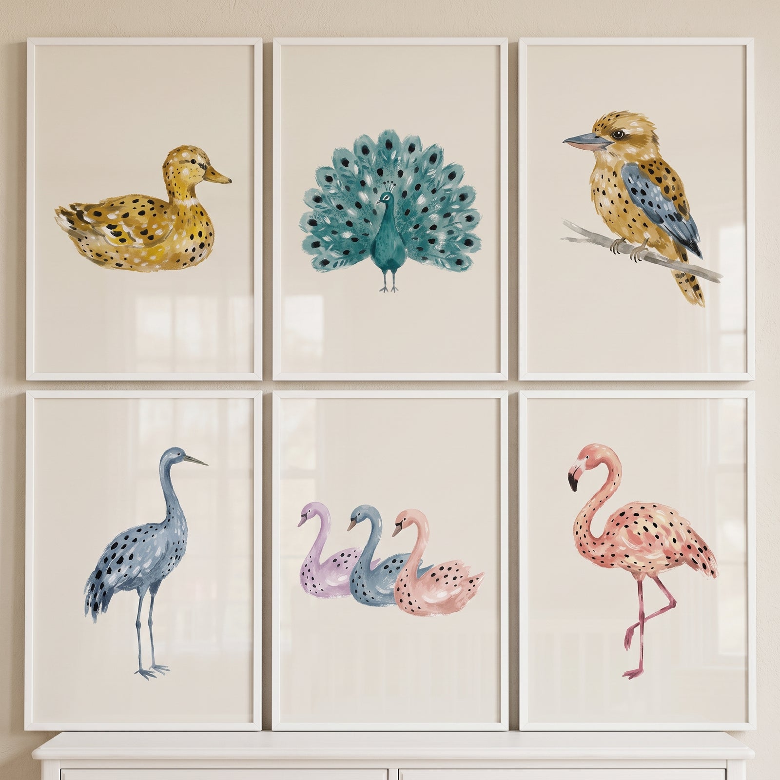 Muted watercolor spotted birds wall art set of 6 with a duck, peacock, kingfisher, crane, three swans, and a flamingo.