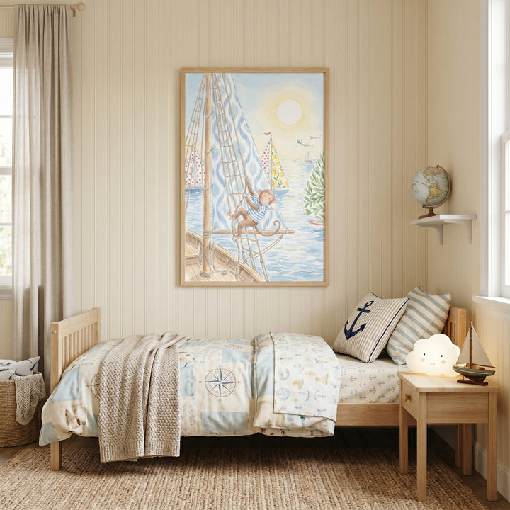A child's room featuring nautical sailing monkey wall art over a wooden bed with a cloud lamp and toy sailboat.