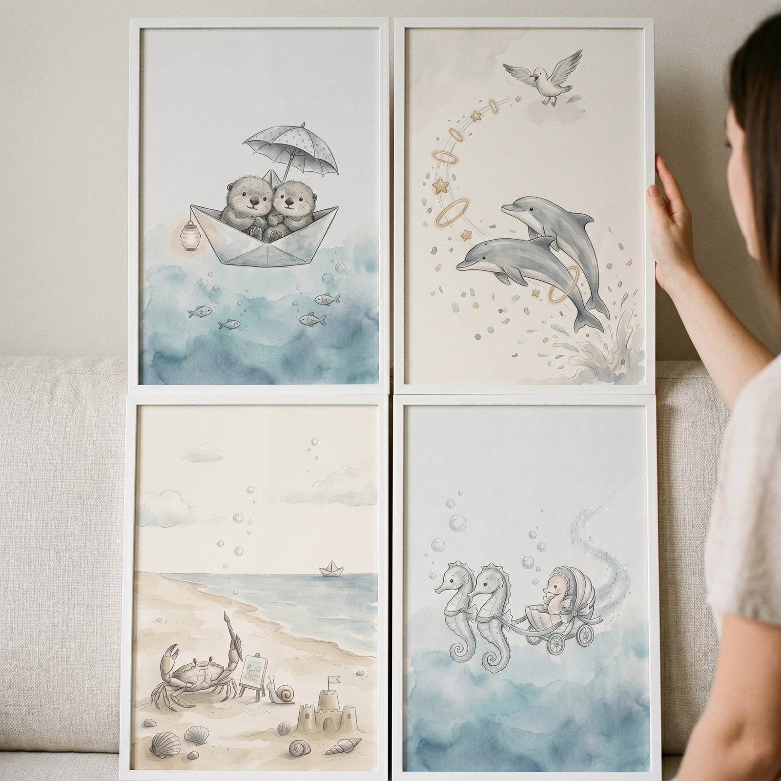 Nautical watercolor sea animal wall art set of 4 featuring framed otters, dolphins, a beach crab, and seahorses.