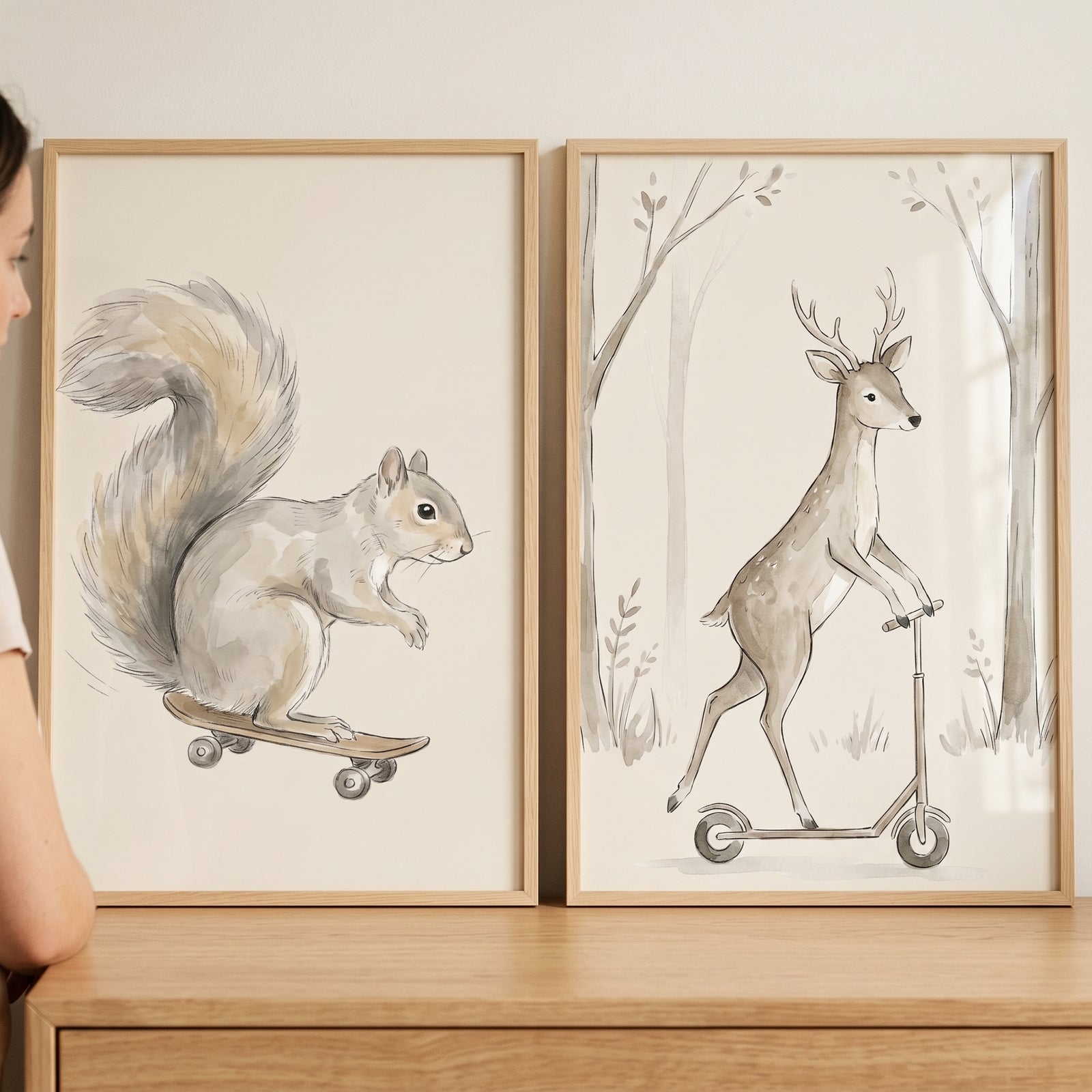 Neutral beige woodland animals wall art set of 2 featuring a squirrel on a skateboard and a deer on a scooter.