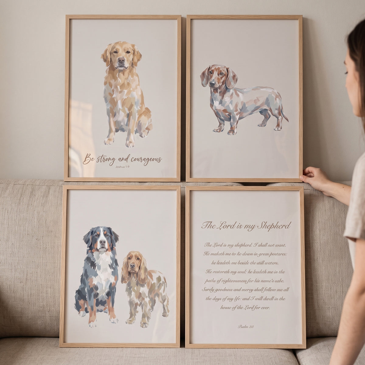 Neutral bible verse dogs wall art set of 4 features watercolor dog illustrations and scripture in light wood frames.