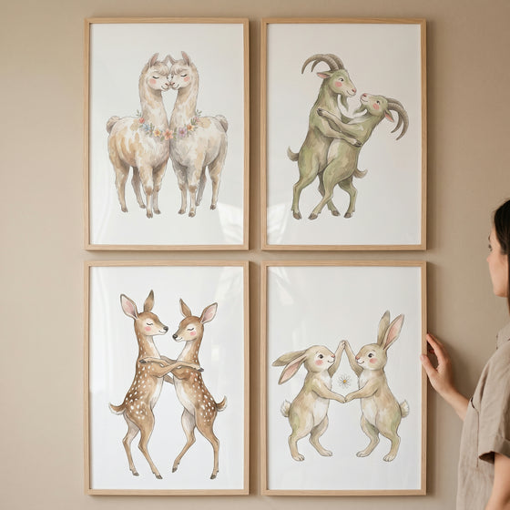 Neutral dancing animal wall art set of 4 featuring paired llamas, goats, deer, and rabbits in a soft watercolor style.