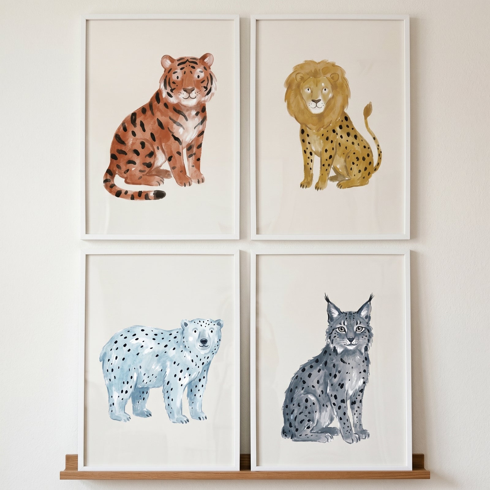 Neutral earthy spotted animals wall art set of 4 featuring watercolor tiger, lion, polar bear, and lynx prints.