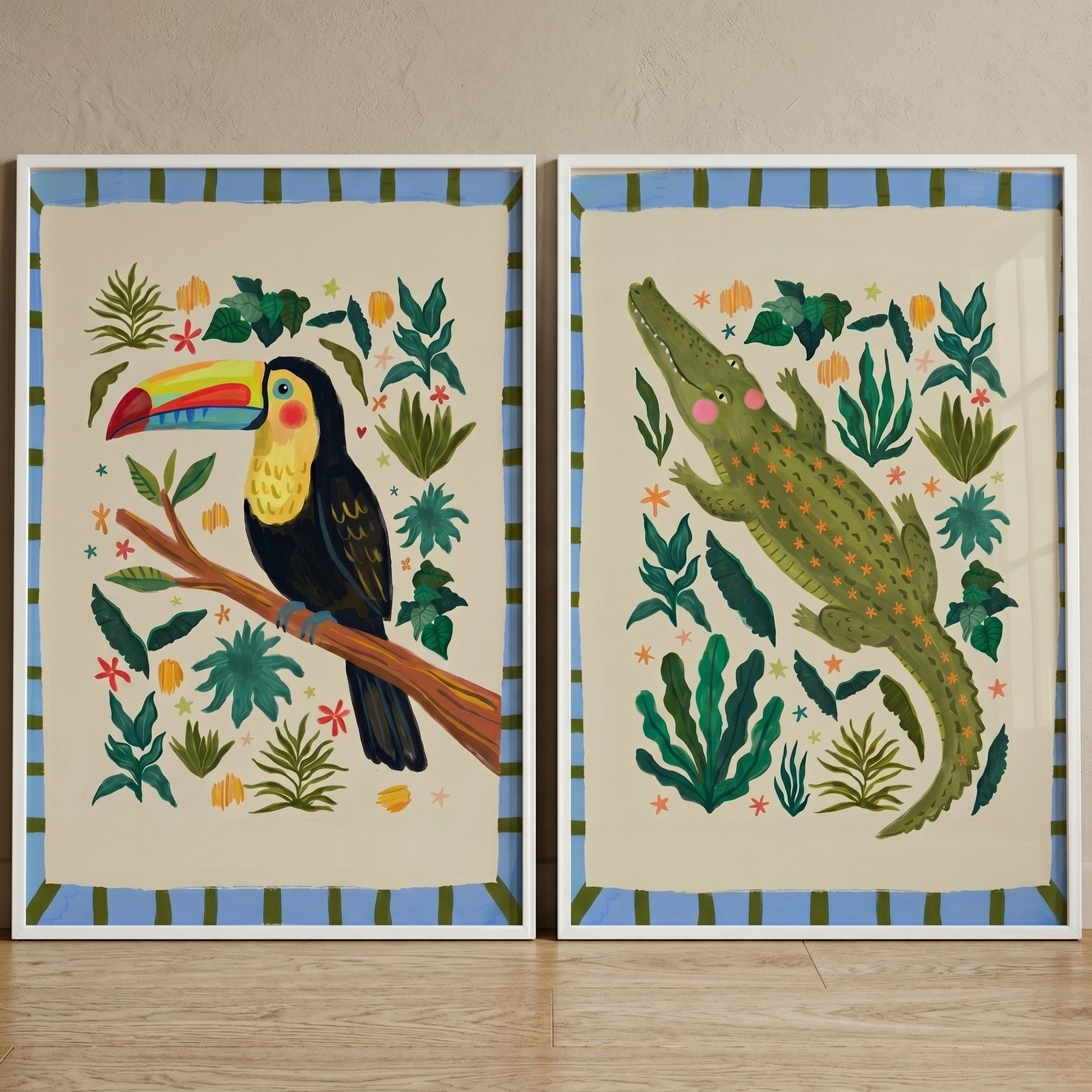 Neutral illustrative jungle animal wall art set of 2 featuring a colorful toucan and a green crocodile among jungle leaves.