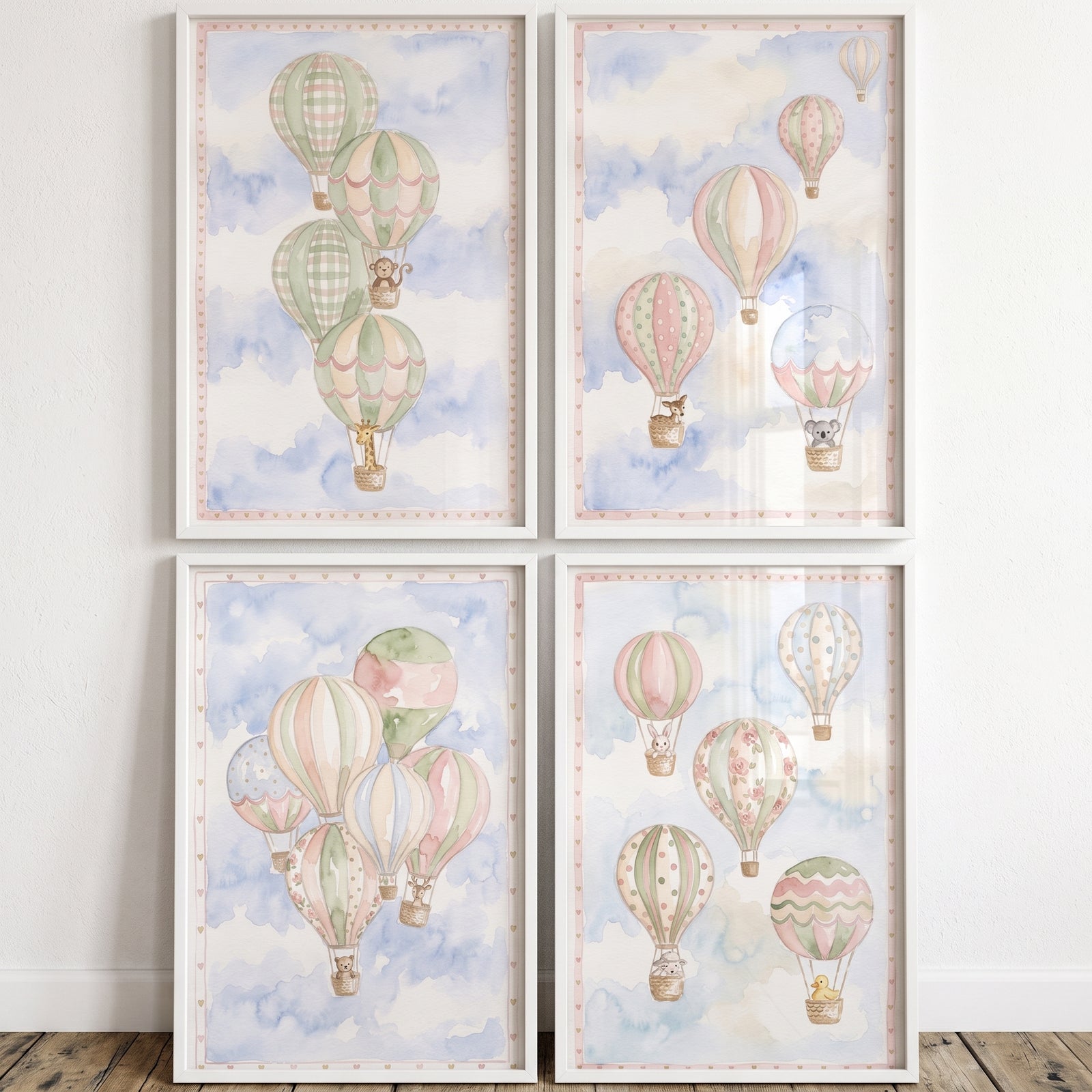 Neutral nursery animal balloon wall art set of 4 features soft watercolor animals in hot air balloons among blue clouds.