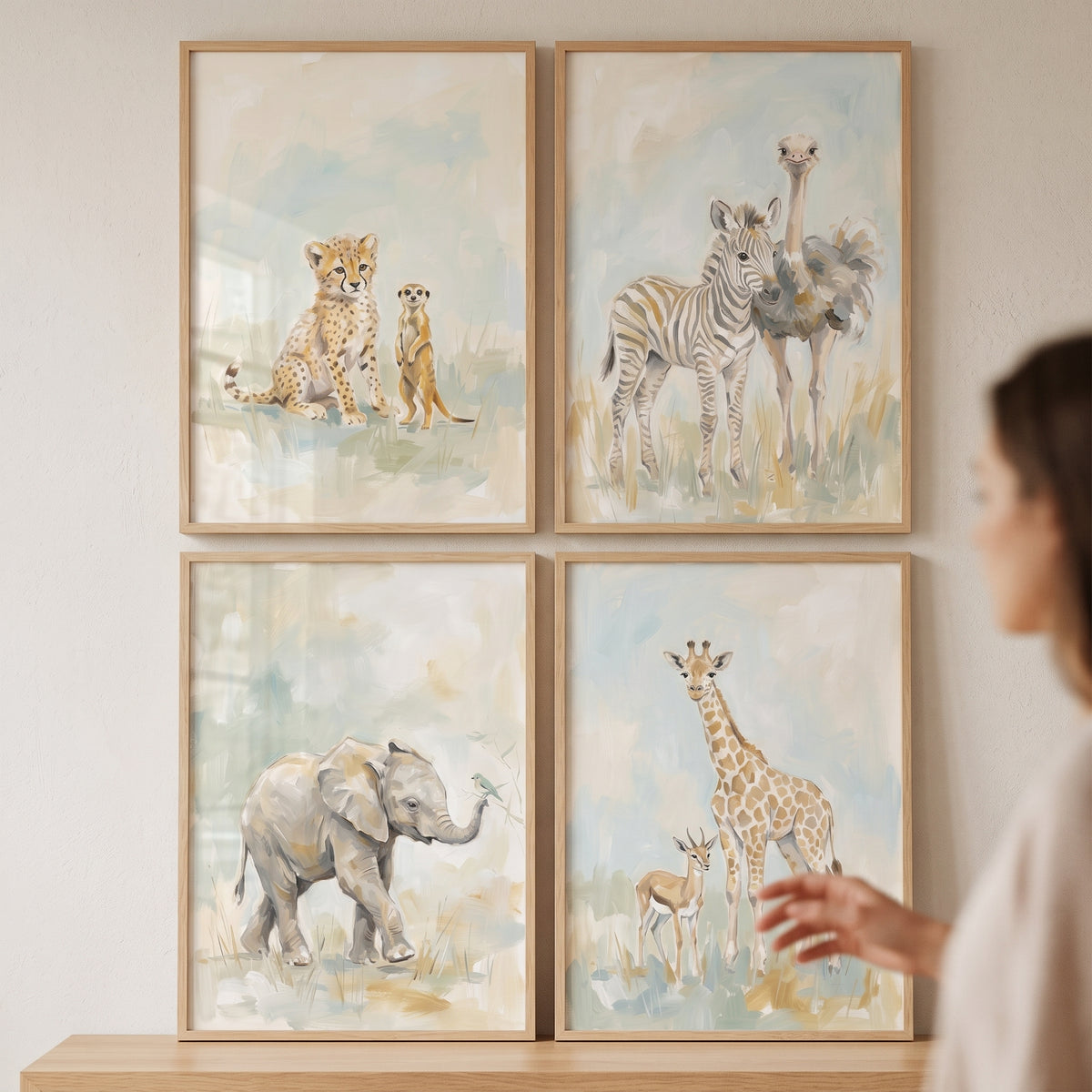 Neutral sage safari animals wall art set of 4 features a giraffe, elephant, zebra, ostrich, and cheetah in wood frames.