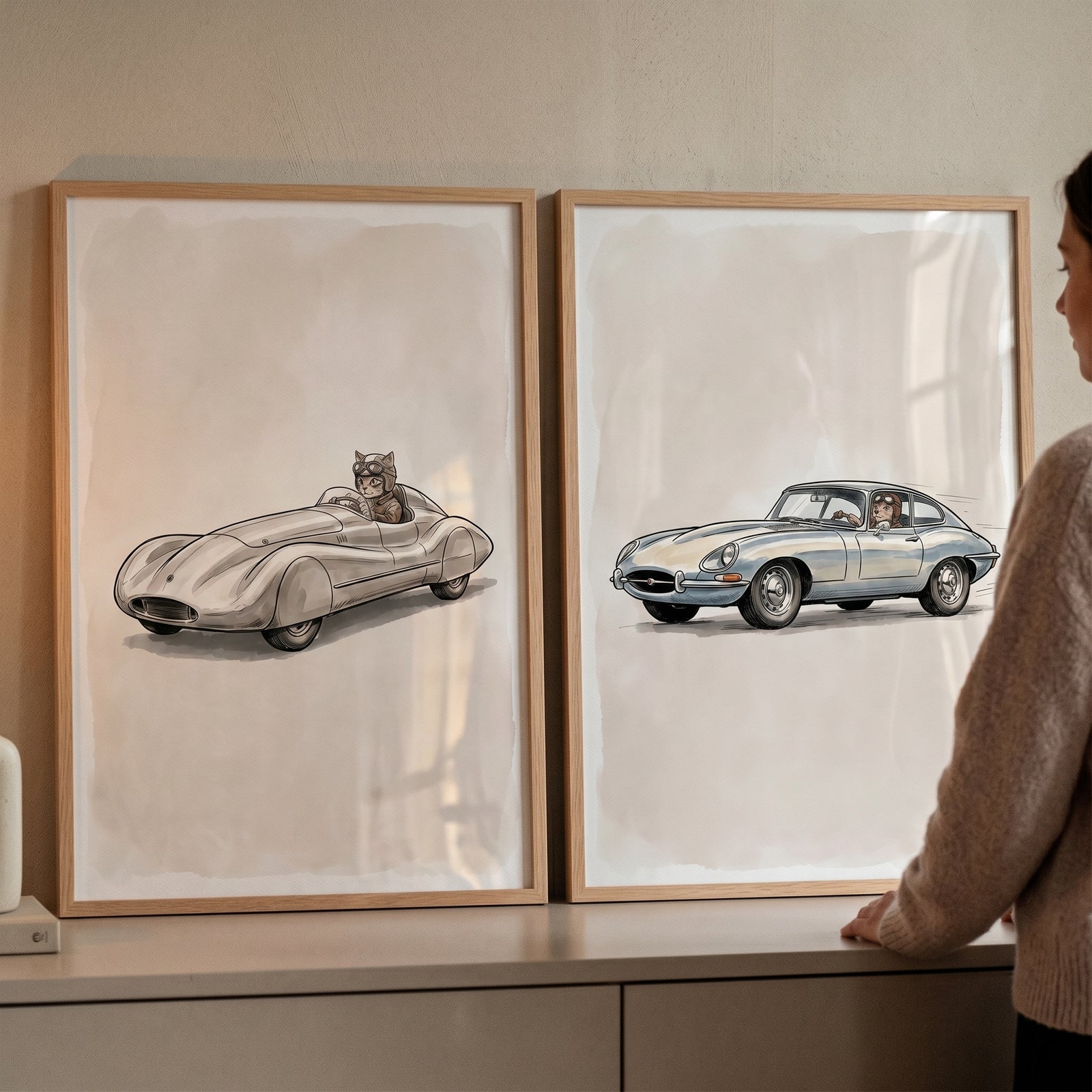 Neutral sepia racing animal wall art set of 2 featuring framed prints of cats driving vintage sports cars.