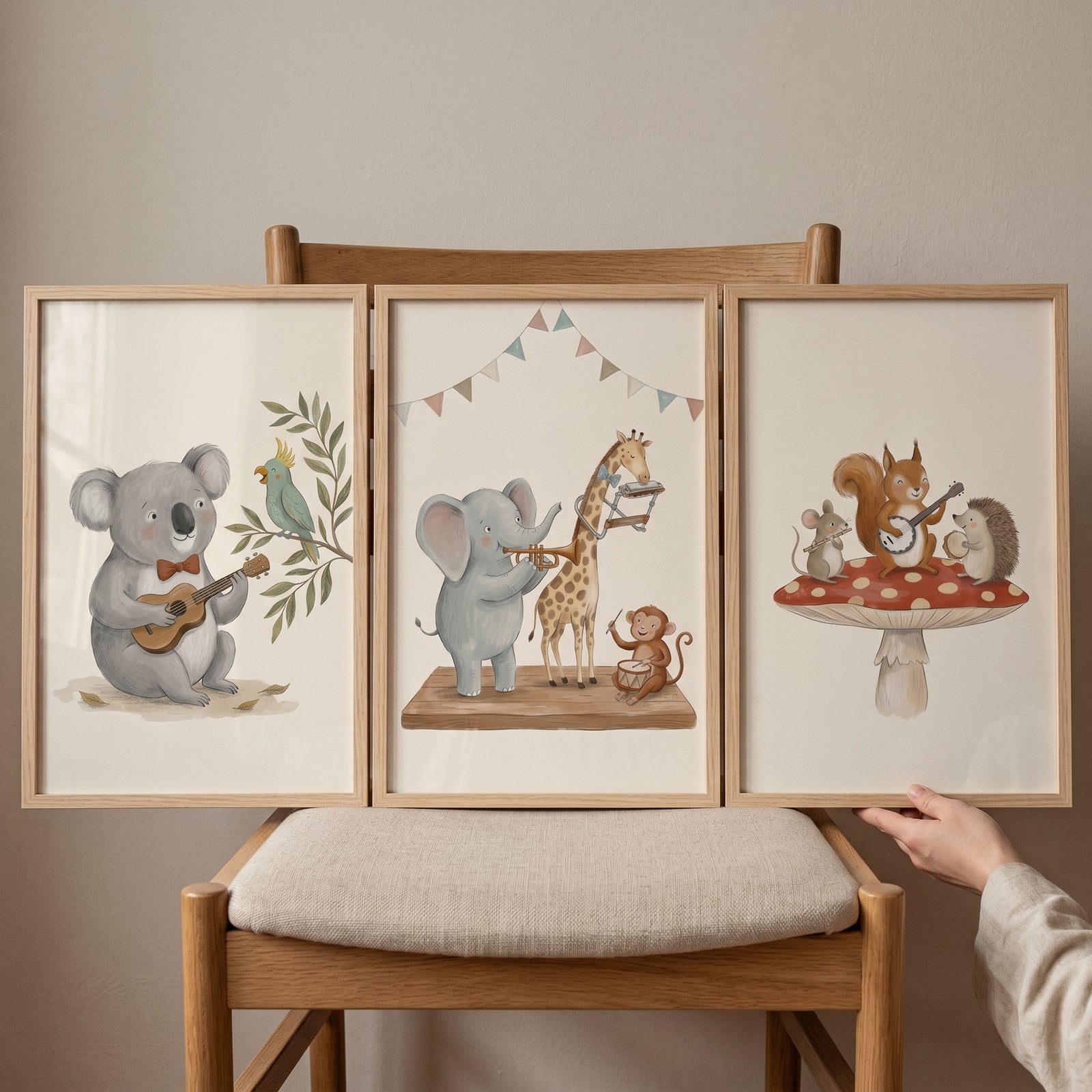 Neutral tone animal band wall art set of 3 features various animals playing musical instruments in wood frames on a chair.