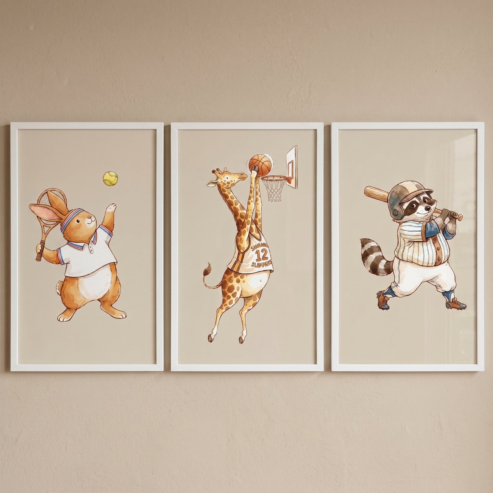 Neutral tone sports animals wall art set of 3 with a rabbit, giraffe, and raccoon playing tennis, basketball, and baseball.