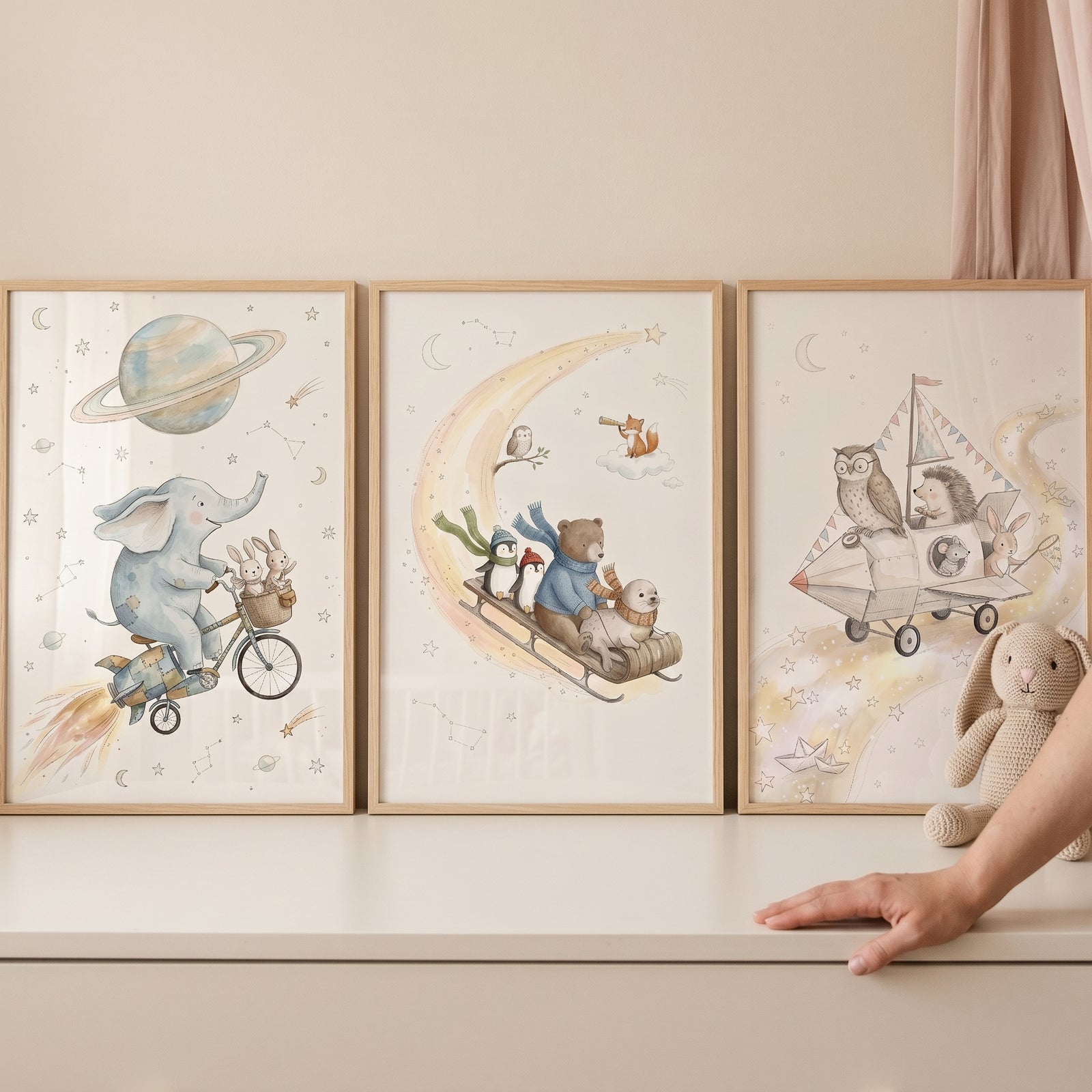 Neutral watercolor adventure animals wall art set of 3 shows animals on a rocket bicycle, moon sled, and flying ship.