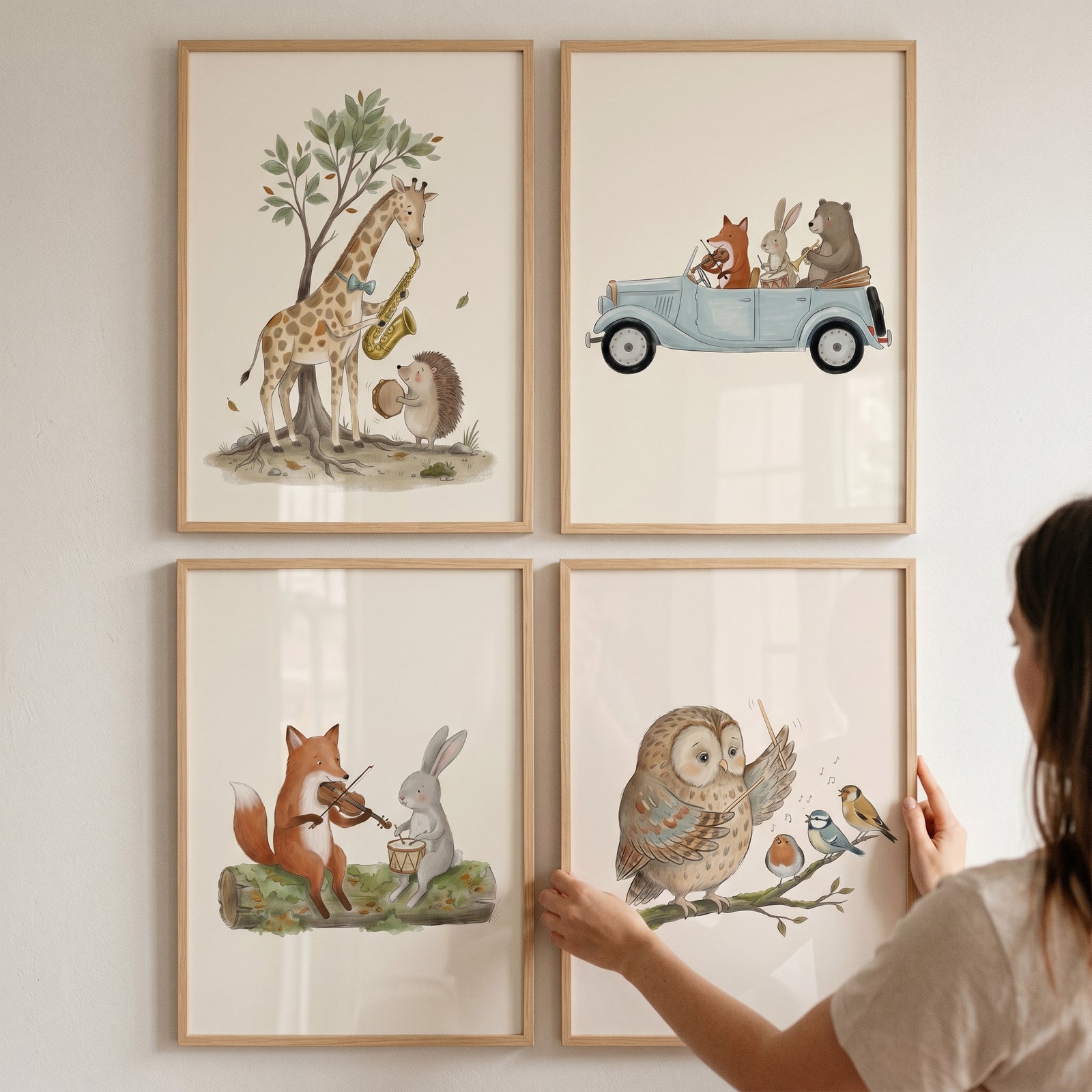 Neutral watercolor band animal wall art set of 4 shows a fox, rabbit, giraffe, and owl with instruments and a car.