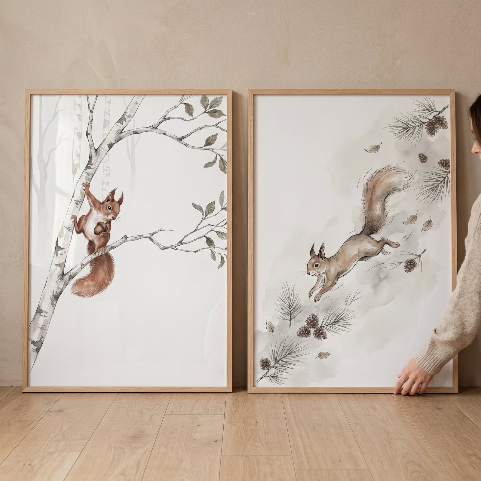 Neutral woodland squirrel wall art set of 2 featuring squirrels on birch and pine branches in watercolor style.