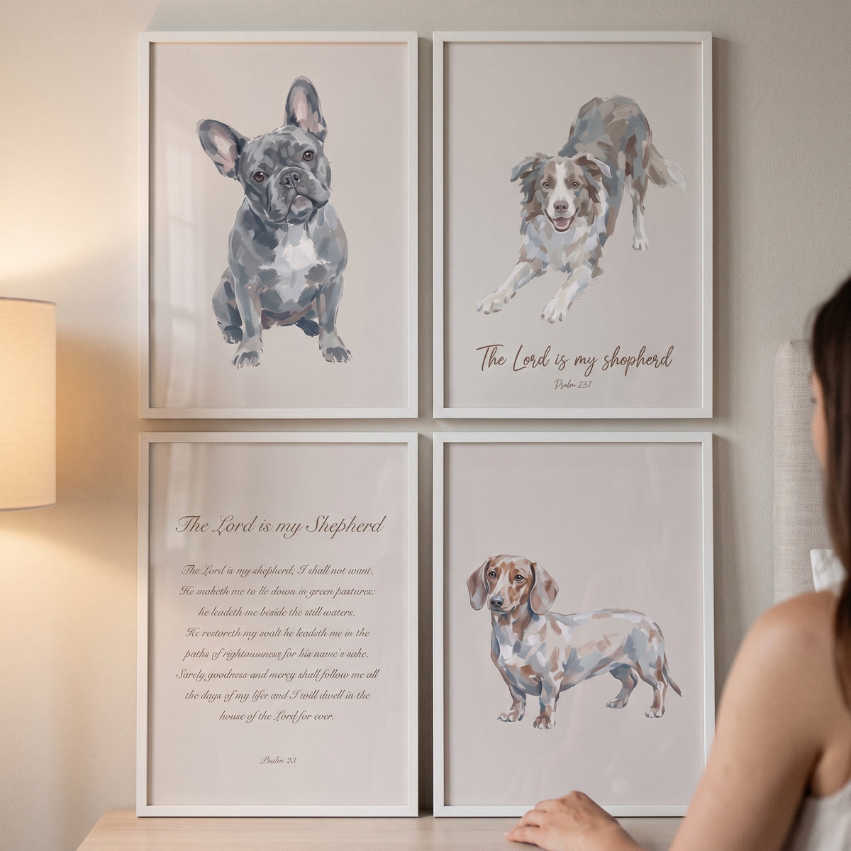 Oatmeal scripture pet dogs wall art set of 4 features dog watercolor art and Psalm 23 text in white frames on a wall.