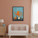 Modern nursery with a white crib, wood dresser, and white armchair. A framed cartoon print of an orange octopus playing drums underwater, surrounded by fish, hangs centrally on the terracotta wall above the crib.