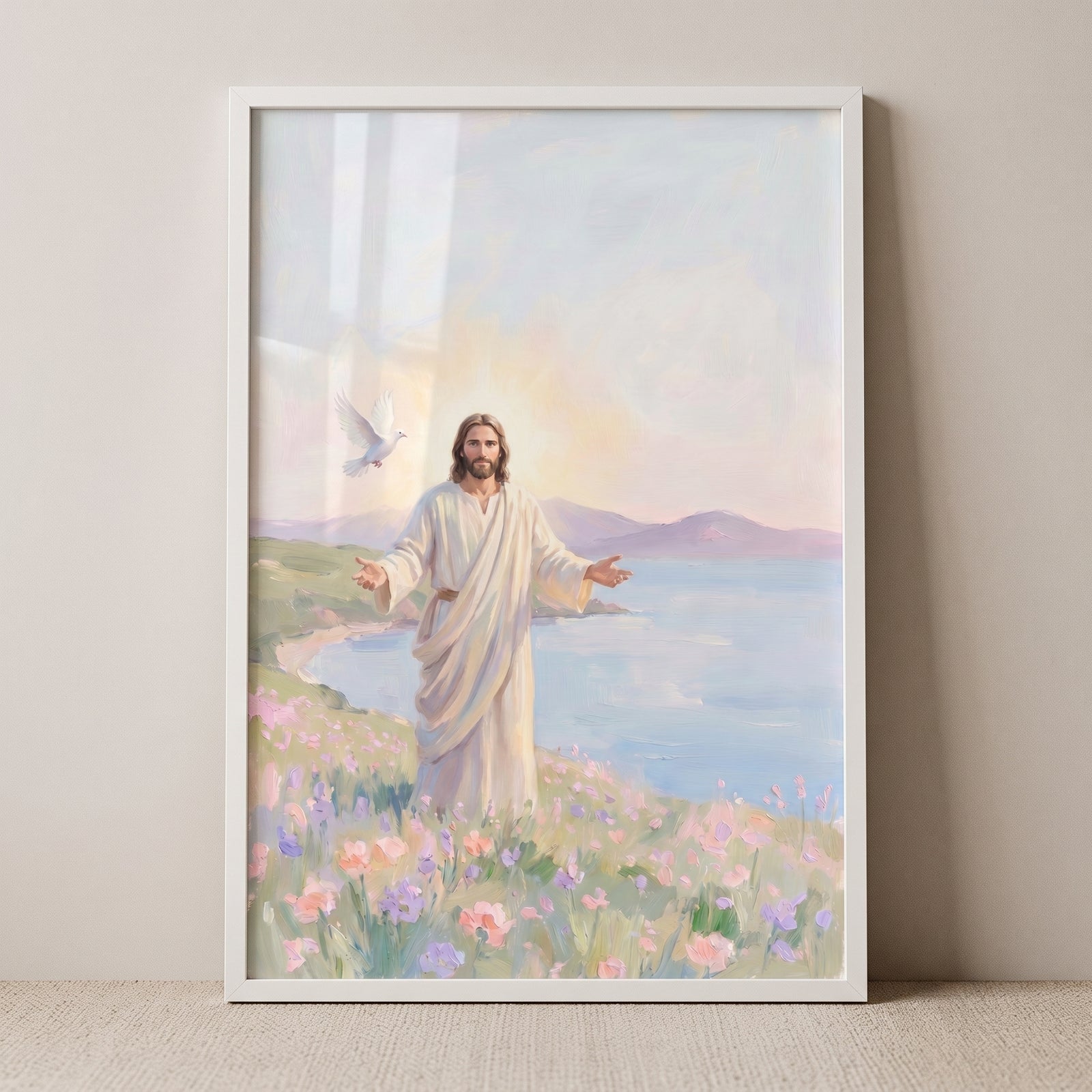 Open arms wildflower jesus wall art shows Christ on a flowery hill by the sea with a white dove and soft morning light.