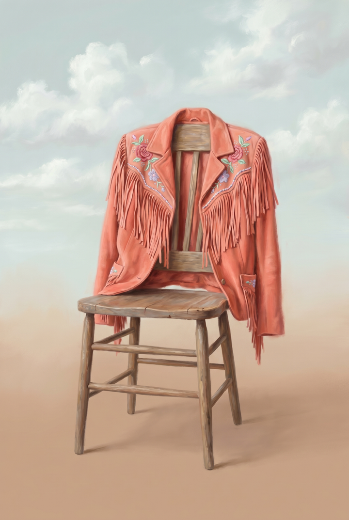 Orange fringed leather jacket wall art of a floral coat on a wooden chair against a cloudy sky and desert ground.