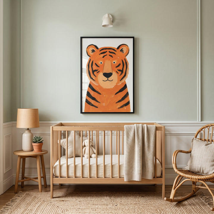 Orange tiger wall art hangs above a wooden crib in a neutral nursery with a wicker rocking chair and side table.