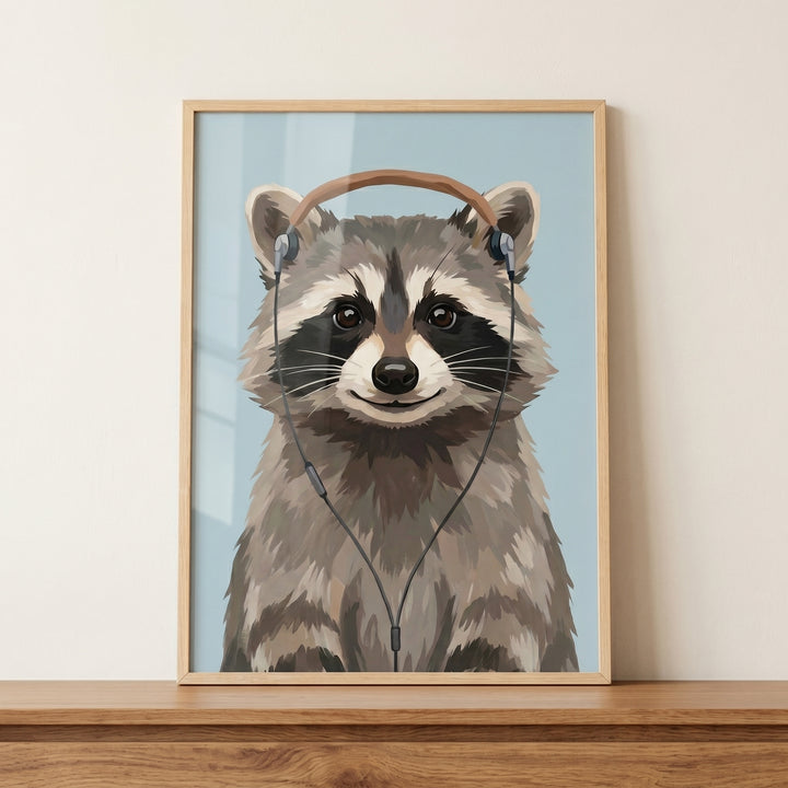Framed over ear headphone raccoon wall art on a wooden shelf, depicting a raccoon against a light blue background.