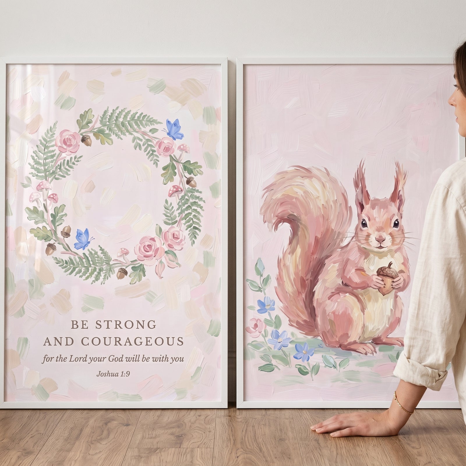 Painterly blush woodland bible wall art set of 2 featuring a squirrel and a floral wreath with Joshua 1:9 scripture.