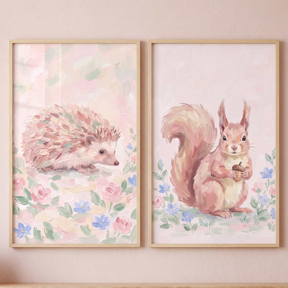 Painterly pink woodland animals wall art set of 2 featuring a hedgehog and a squirrel with an acorn among pastel flowers.