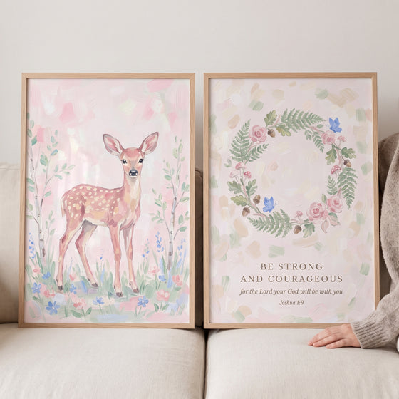 Pale pink forest floral wall art set of 2 featuring a fawn and a botanical wreath with the bible verse Joshua 1:9.