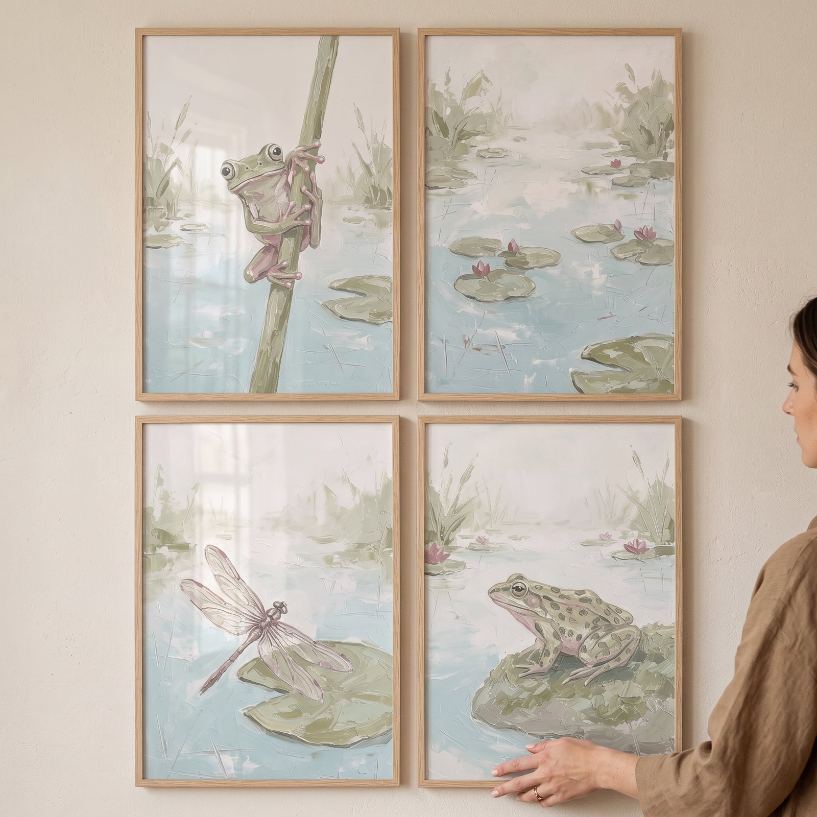 Pale sage wetland nature wall art set of 4 featuring frogs and a dragonfly in thin wood frames on a neutral wall.