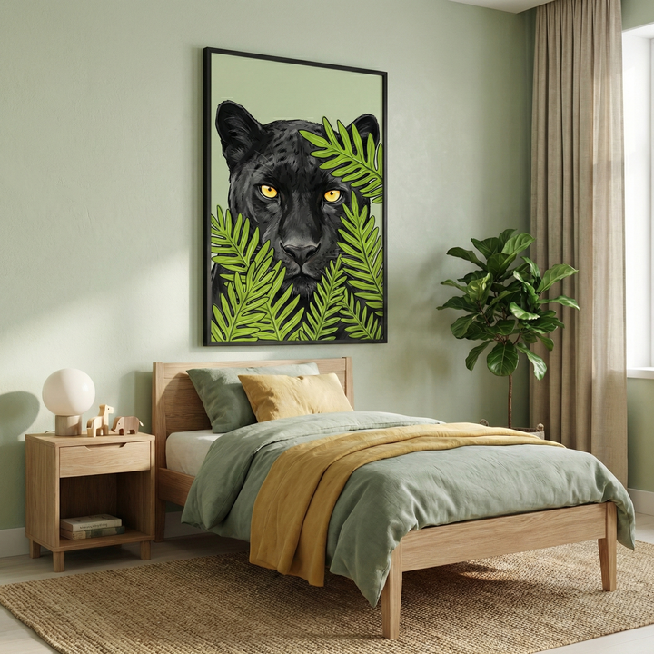 A cozy bedroom features a wooden bed with green and yellow bedding, next to a small wooden nightstand with a round lamp and decorative items. A large artwork of a black panther peeking through lush green leaves hangs on the wall above the bed. A leafy plant stands in the corner, and soft natural light streams in through a window with beige curtains.