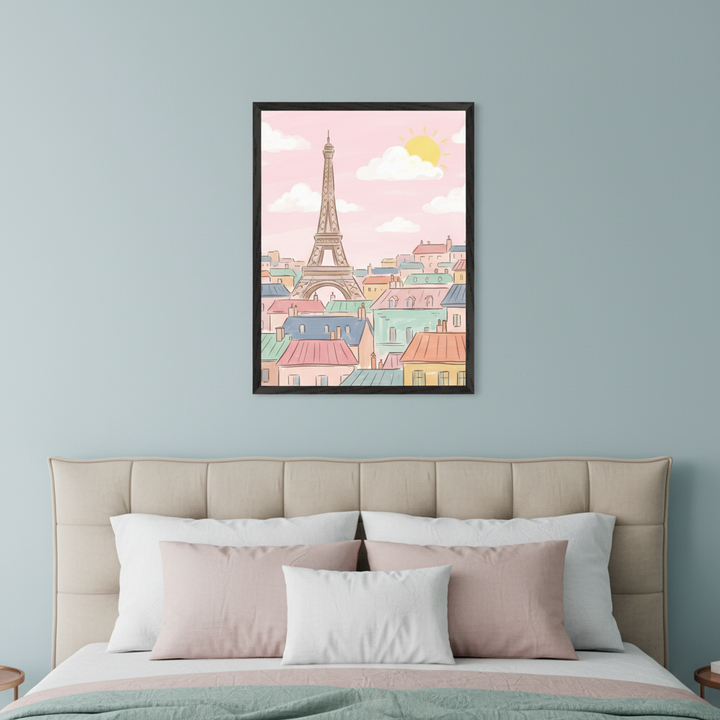 Modern bedroom with a beige upholstered bed and pillows. A framed cartoon print of the Eiffel Tower, pastel rooftops, and a pink sky with sun hangs centered above the bed.