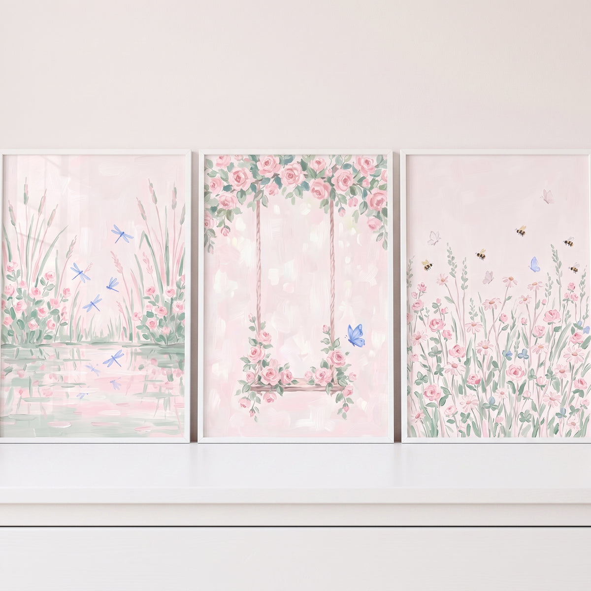 Pastel blush garden wall art set of 3 featuring a pond with dragonflies, a swing with roses, and a meadow with bees.