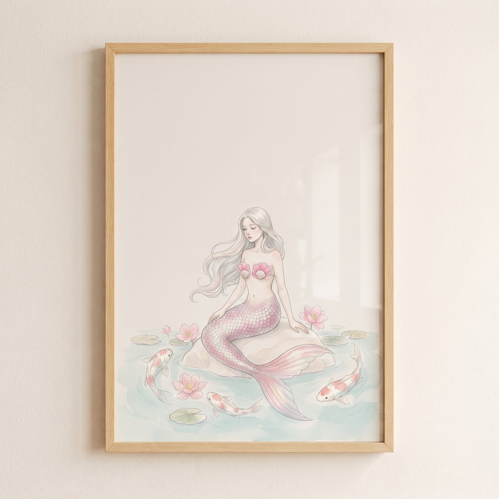 Framed pastel koi fish mermaid wall art of a mermaid on a rock among pink lotus blossoms and swimming koi fish.