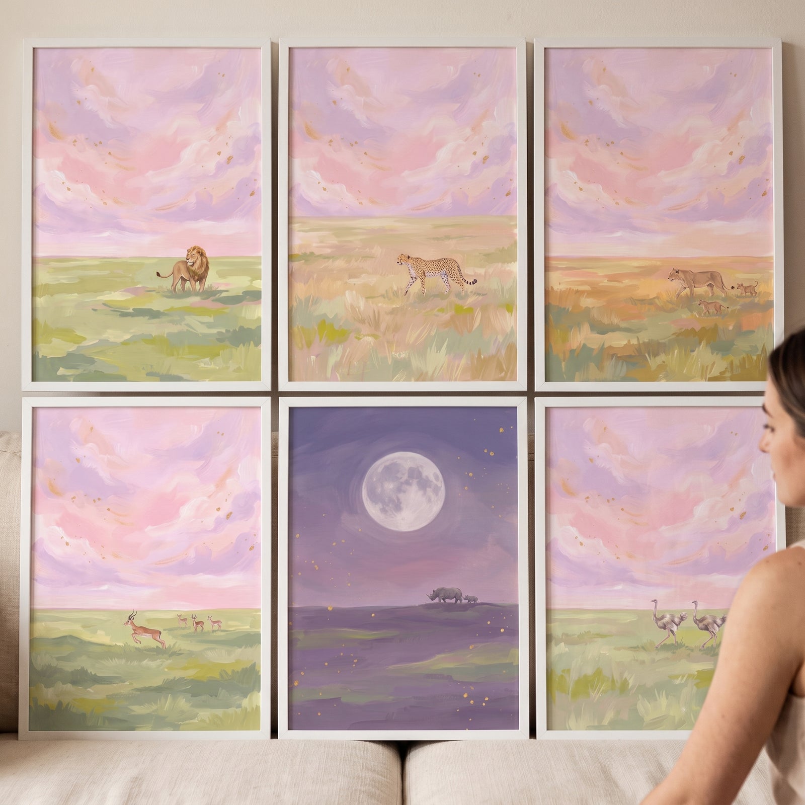 Pastel pink african animals wall art set of 6 featuring safari wildlife under soft-colored sunset and moonlit skies.