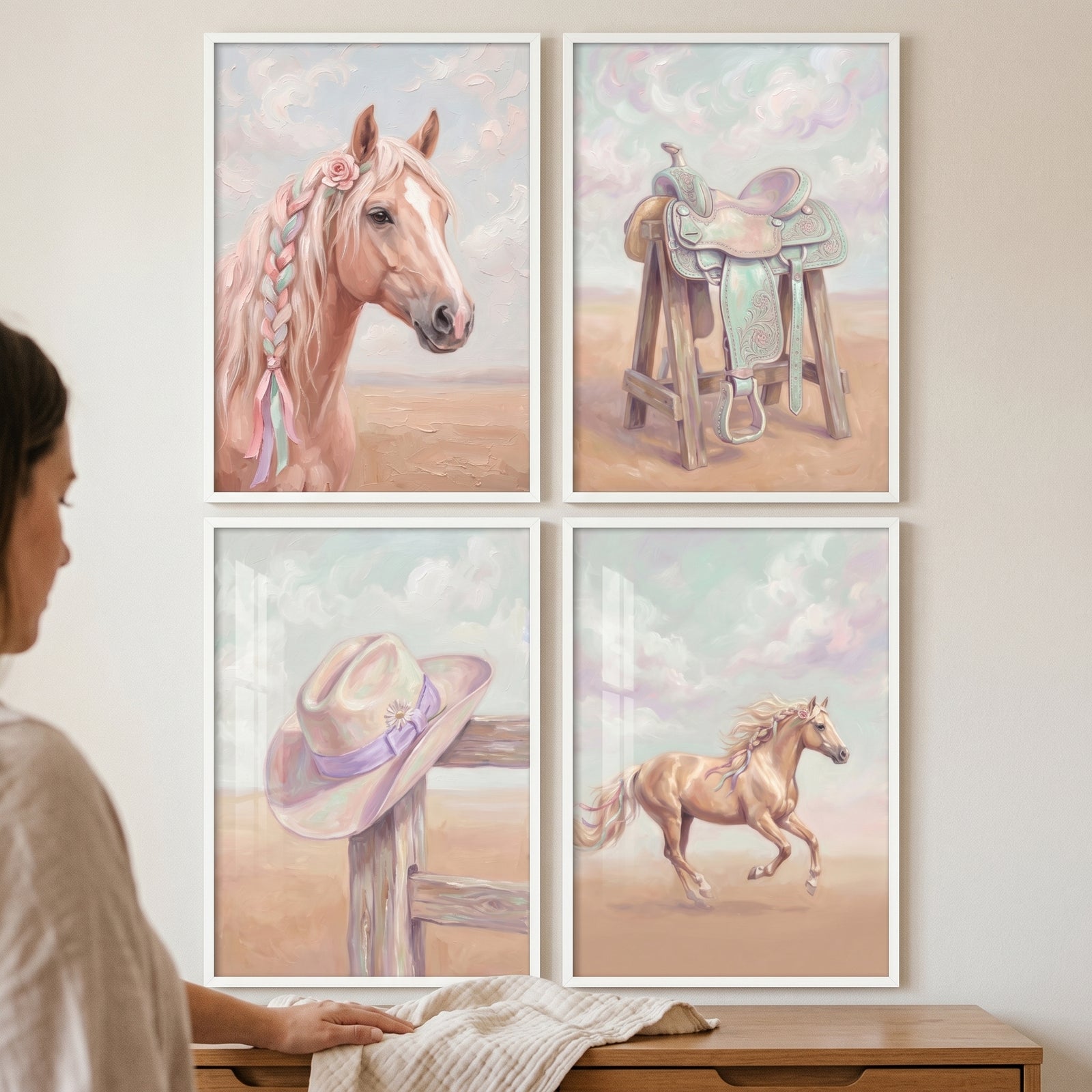 Pastel pink palomino horse wall art set of 4 with a braided horse, a saddle, a cowboy hat, and a galloping horse.