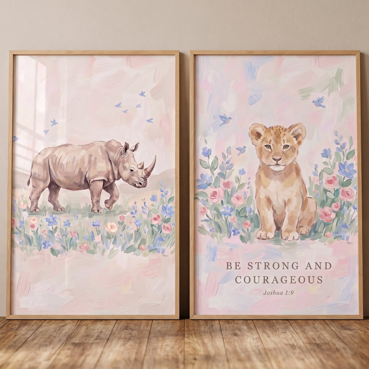 Pastel pink safari animals wall art set of 2 featuring a rhino and a lion cub with Be Strong and Courageous text.