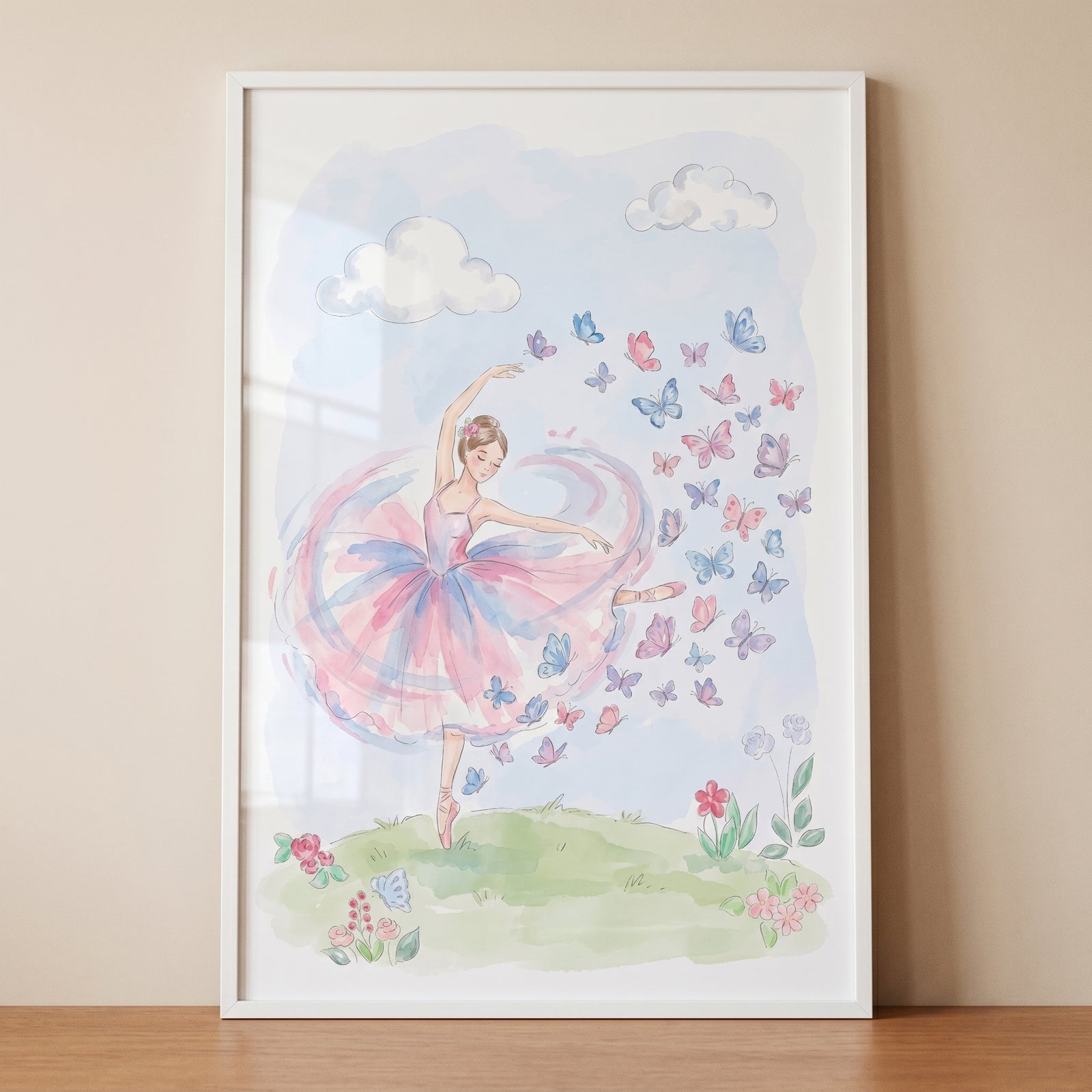 Framed watercolor-style pastel pink tutu ballerina wall art featuring a dancer with butterflies and flowers.