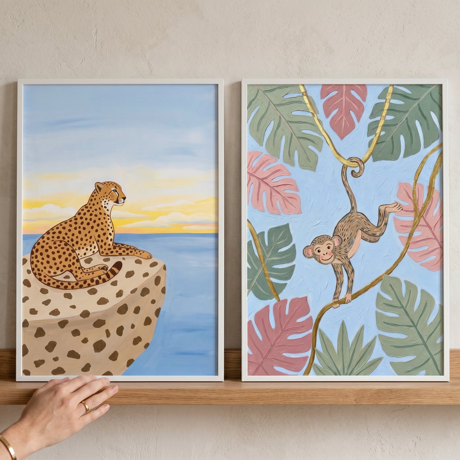 Pastel tropical safari animal wall art set of 2 featuring a cheetah on a rock and a monkey hanging from jungle vines.