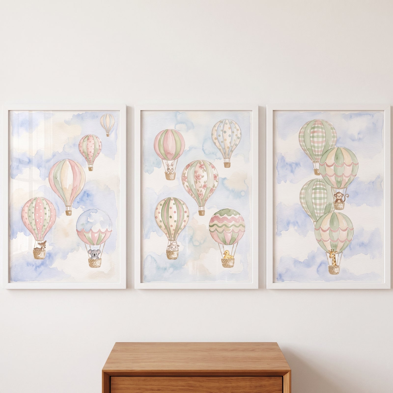 Pastel whimsical animal balloon artwork set of 3 depicts cute animals in hot air balloons against a soft sky.