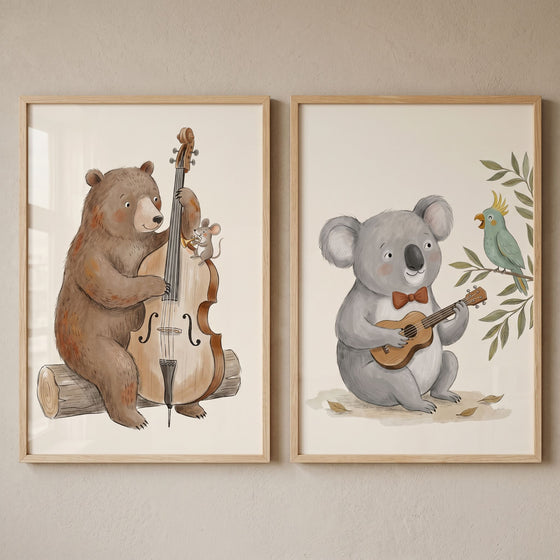 Pastoral watercolor musical animals wall art set of 2 with a bear on a log playing bass and a koala playing guitar.