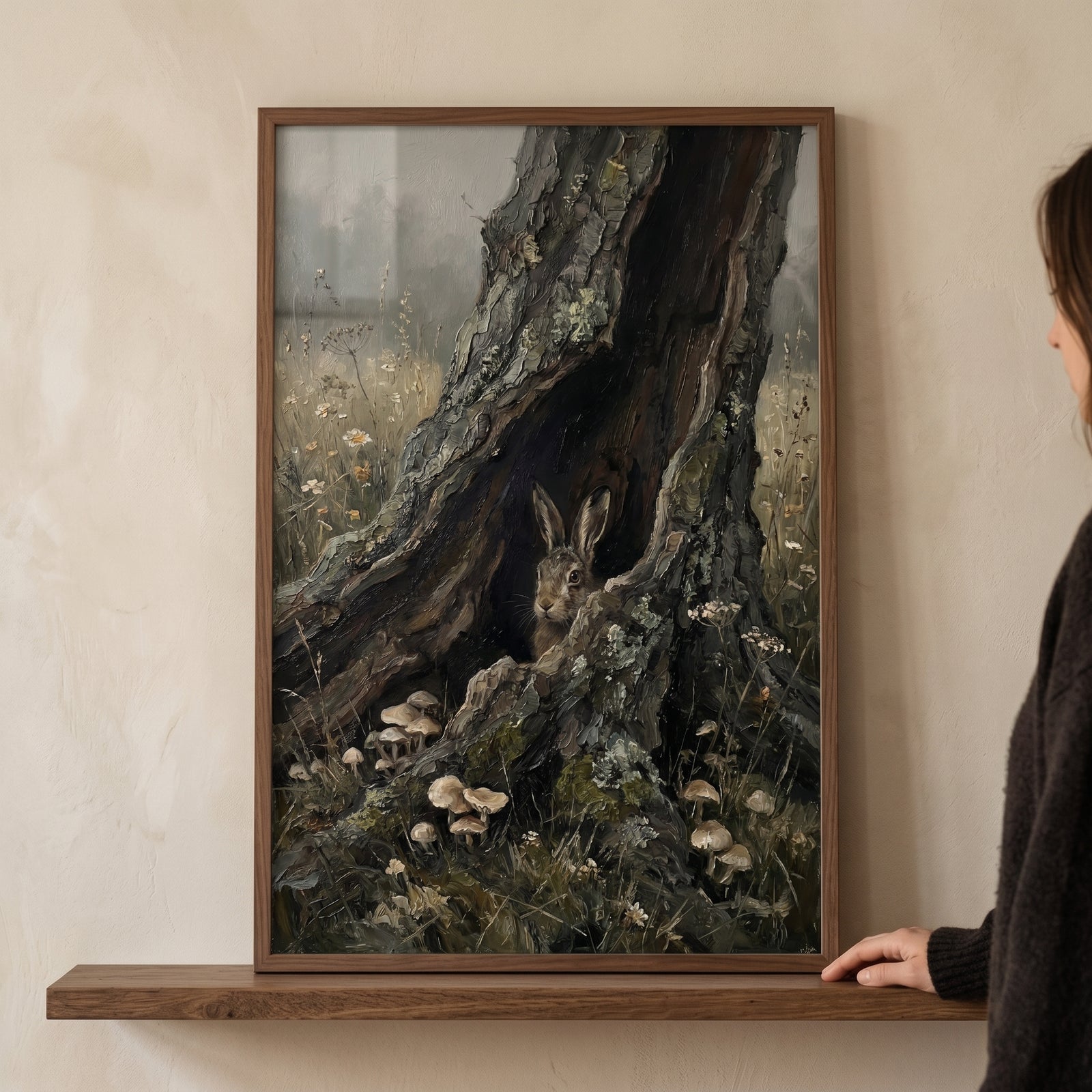 Peeking tree hollow rabbit wall art depicts a brown rabbit looking out from a dark tree trunk with mushrooms.