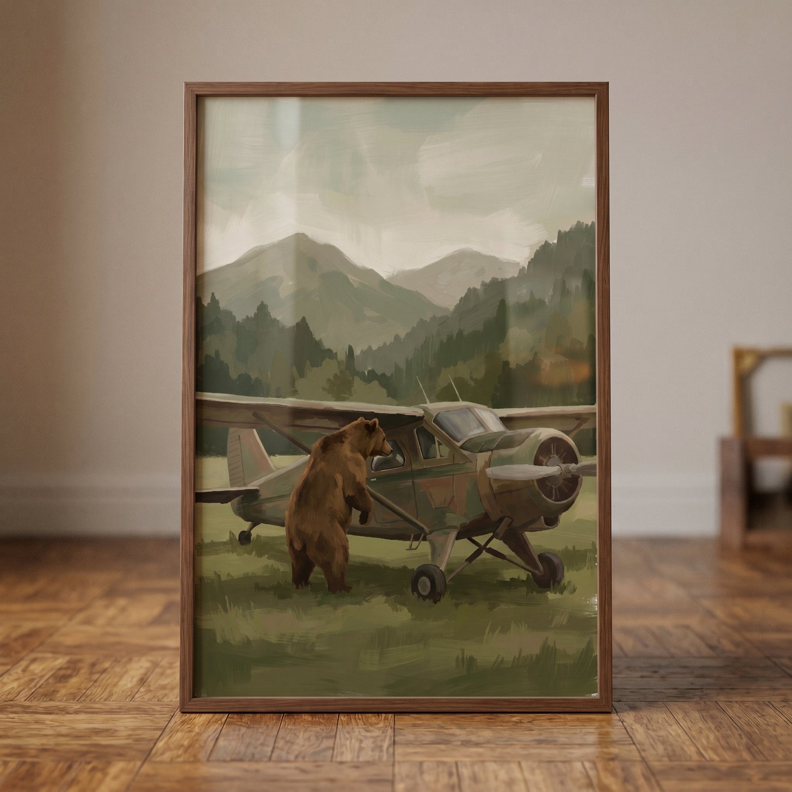 A brown bear stands on its hind legs beside a small plane with mountains in peering into plane bear wall art.