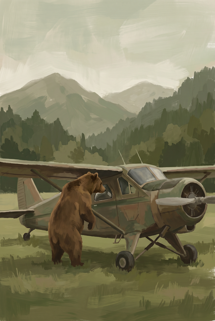 Brown bear peering into plane bear wall art in a scenic landscape with mountains and evergreen trees.