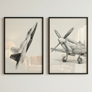 Two framed black and white sketches hang side-by-side on a neutral-colored wall. The sketch on the left features a sleek, modern jet fighter captured mid-flight from a dynamic, low-angle perspective. The drawing on the right depicts a classic, vintage propeller-driven aircraft resting on the ground, showcasing its large four-blade propeller and engine details. Both pieces are rendered in a realistic, hand-drawn style with fine lines and soft shading.
