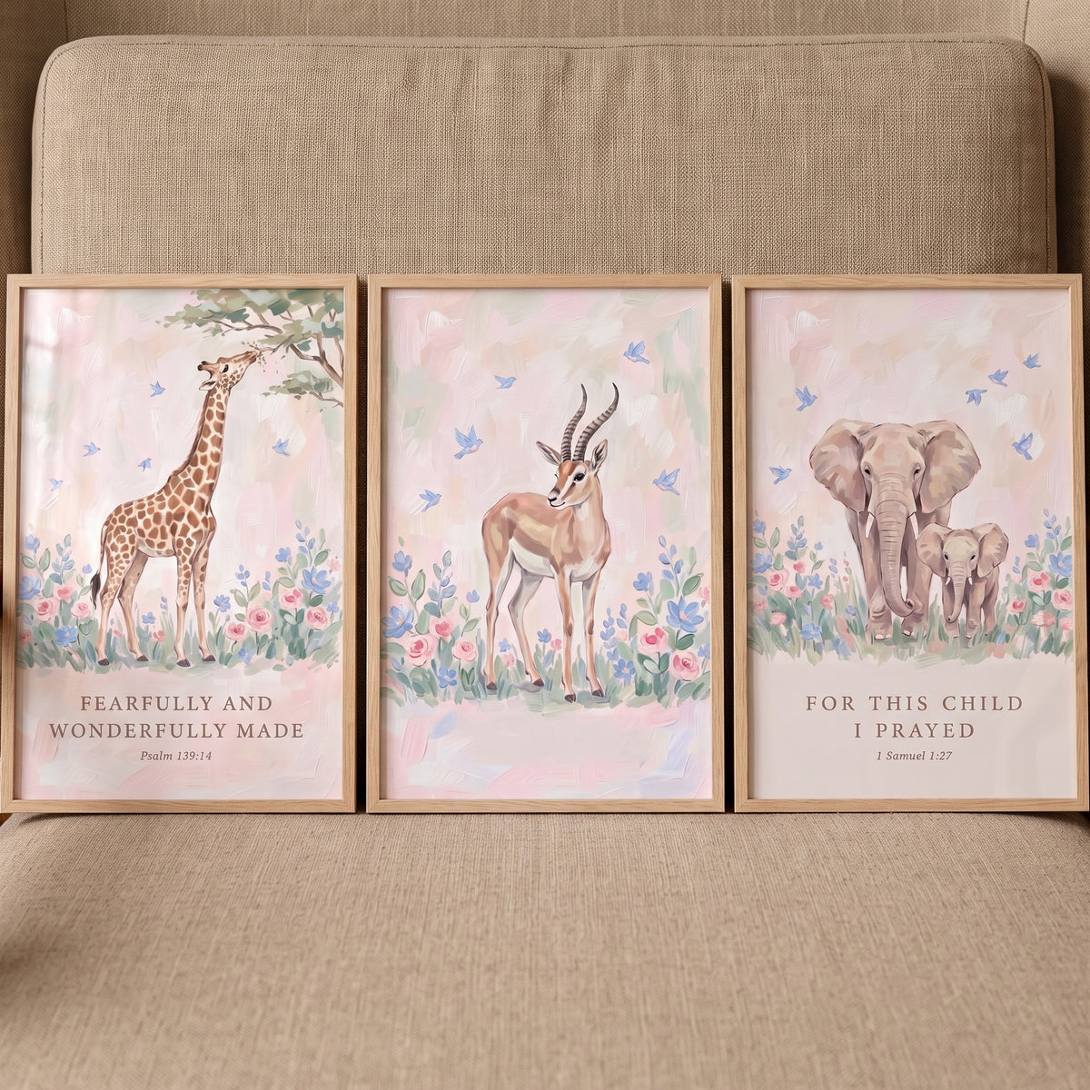 Pink bible safari animals wall art set of 3 with giraffe, antelope, and elephant prints featuring scripture verses.